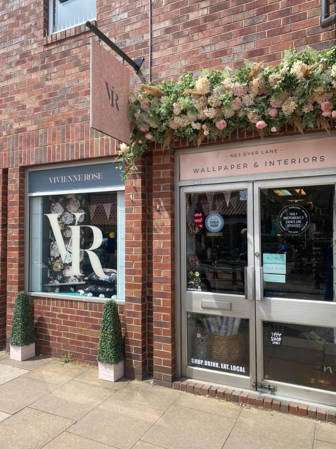 The Vivienne Rose Wallpaper & Interiors shopfront on Dyer Lane, Beverley, with florals over the window